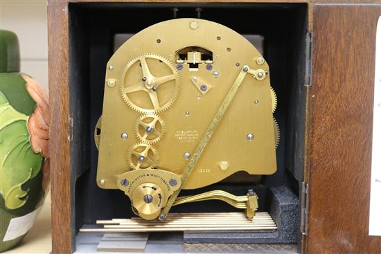 An Elliot mahogany eight day striking and chiming mantel clock, on bracket